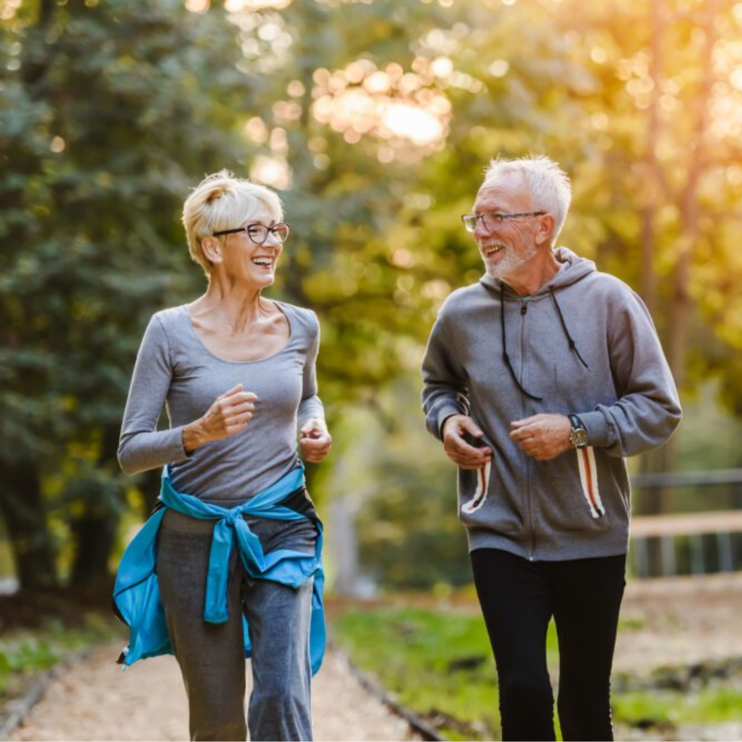 Healthy old man and old women jogging together